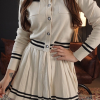 Дамски плетен бежов комплект – жилетка и плисирана пола