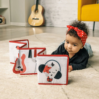TINY LOVE Мека двулицева текстилна книжка обиколник Double Sided First Book от серията Tiny Rockers 0м+