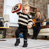 Tiny Love Електронна музикална играчка DJ Станция от серията Tiny Rockers с 13 рокендрол мелодии въртяща се peek-a-boo плоча 12м+