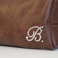CUSTOM SMALL LEATHER TOILETRY BAG IN MADELINE