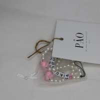 ROUÉxPÂO BON COEUR toiletry bag charm