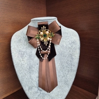 Chocolate brown bow brooch