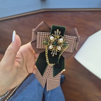 Chocolate brown bow brooch