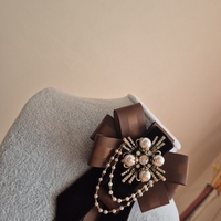 Chocolate brown bow brooch