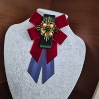 Blue and burgundy brooch