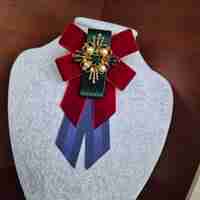 Burgundy and blue bow brooch