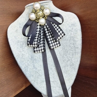 Black and white Bow brooch