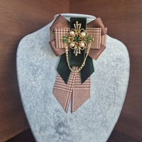 Chocolate brown bow brooch