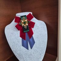 Burgundy and blue bow brooch