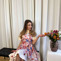 Флорална рокля в кремаво