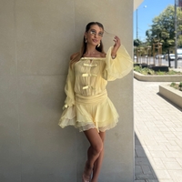 Рокля в жълто с панделки