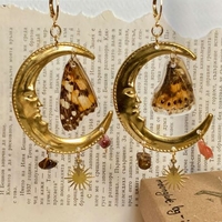 Gold earrings with moons