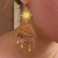 Gold earrings with butterfly wings
