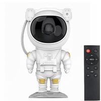 НЕМСКА Интерактивна играчка за прожектиране на космоса, Астронавт STARBOY, Таймер за изключване + ЛЕД ФЕНЕР