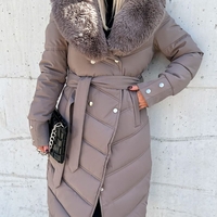 Елегантно капитонирано палто с удължен силует