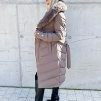 Елегантно капитонирано палто с удължен силует