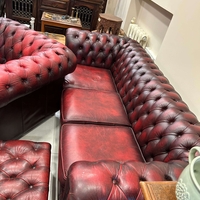 Табуретка, фотьойл и троен диван Chesterfield Oxblood.