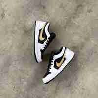 Air Jordan 1 Low “Gold Swoosh”