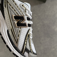 New Balance 1906R Black Gold
