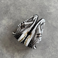 New Balance 1906R “Black Gold”