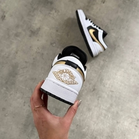 Air Jordan 1 Low “Gold Swoosh”