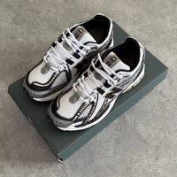 New Balance 1906R “Black Gold”