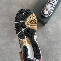 New Balance 1906R “Black Gold”