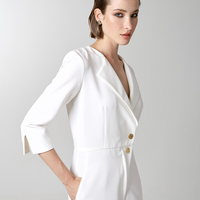 Jumpsuit with monogram buttons in white