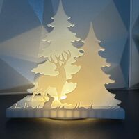 Светещ декор с елен в гора