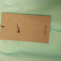 Nike Dri-FIT тенис пола с клин - XS