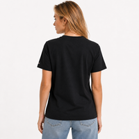 TOMMY JEANS тениска • M