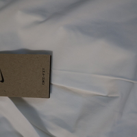 Nike Dri-FIT тенис пола с вграден клин • S