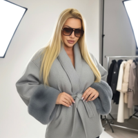 Grey Luxe – елегантно късо палто с колан и пухкави маншети