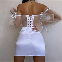 “Tulle Desire” –Сет от бюстие с тюлен ръкав и сатенена пола