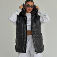 Nordic Chic – Издължен пухен елек с пухена качулка