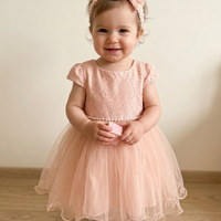 Рокля с дантела и тюл в нежен прасковен нюанс