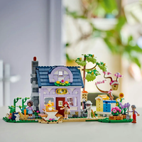 LEGO® Friends Пчеларска къща и цветна градина 42669