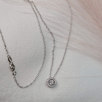 Комплект от бяло злато и циркони