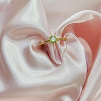 Златен пръстен от 18К злато с Перидот Gumon