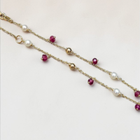 Златна гривна с перла и рубинче