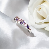 Златен пръстен с розови и лилави циркони