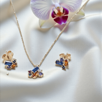 Златен комплект с цветни циркони 