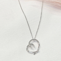 Дамско колие от бяло злато и циркони Сърце