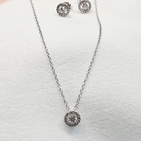 Комплект от бяло злато и циркони