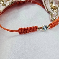 Гривна на конец с Топаз и елементи oт 18К злато Gumon