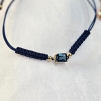 Гривна на конец с Топаз Лондон Блу и елементи от 18К злато Gumon