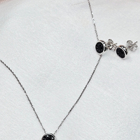 Комплект от бяло злато с черни циркони 