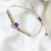 Гривна на конец с Аметист и елементи от 18К злато Gumon