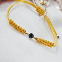 Гривна на конец с Топаз Лондон Блу и елементи от 18К злато Gumon