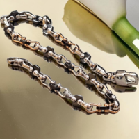 Златна гривна от бяло и розово злато с елементи от керамика